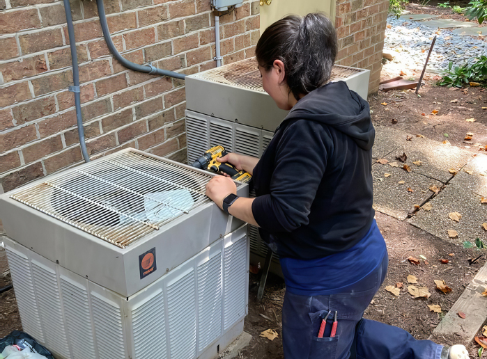 Technician Conducting an AC Repair in Wake Forest, NC