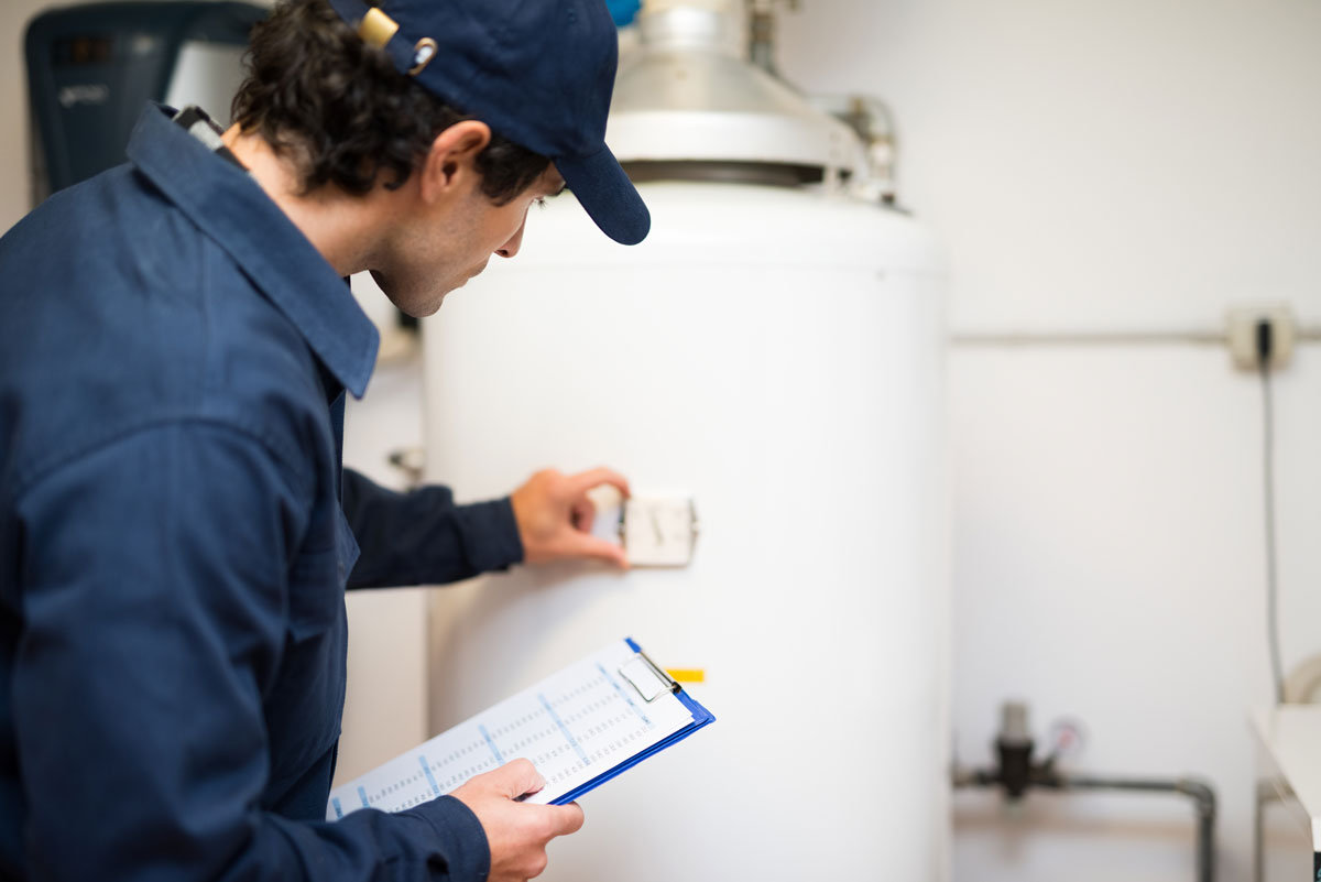 Technician performing Water Heater Repair in Downtown Raleigh, NC
